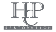 Gray “HHP” logo with “RESTORATION” in spaced white letters on a dark banner below.