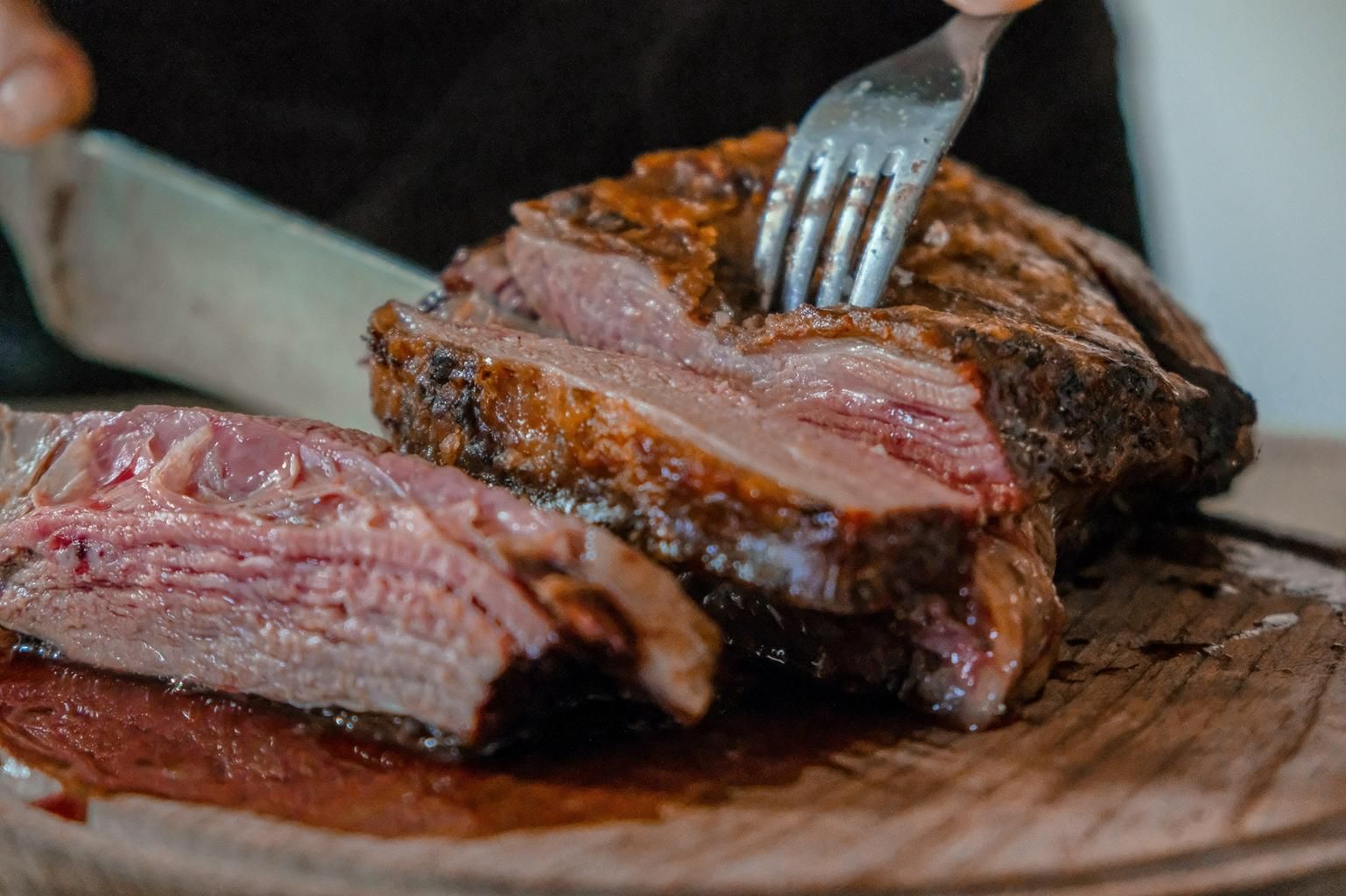 A Fork on A Piece of Meat