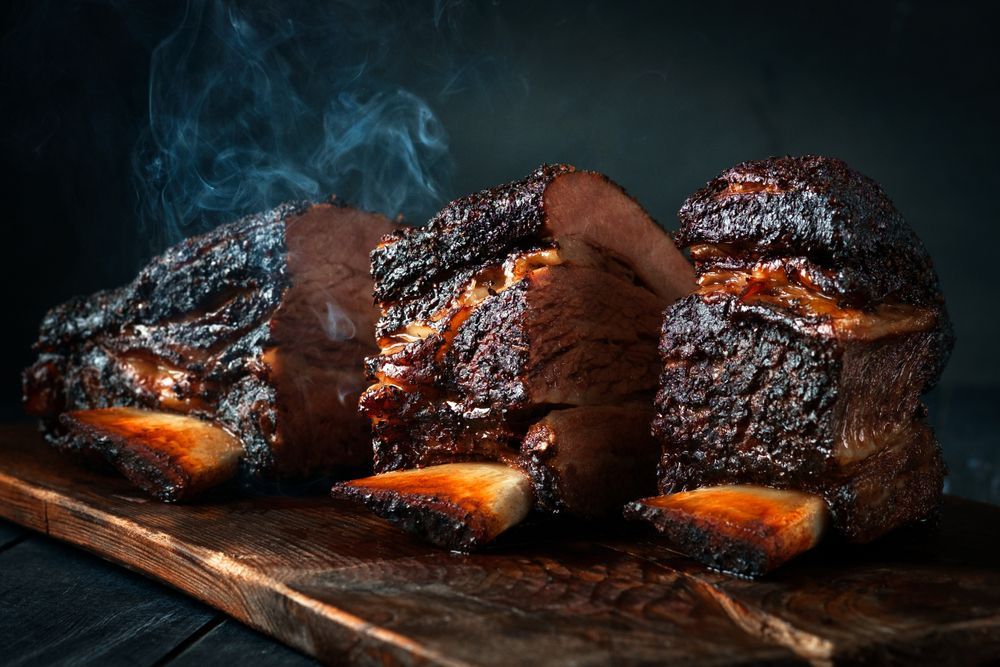 Cut a large piece of smoked beef brisket — Wholesale Butchery in Walgett, NSW