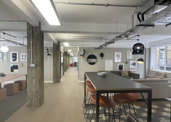 There is a long table in the middle of the room.