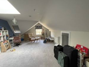 There is a lot of luggage in the attic.
