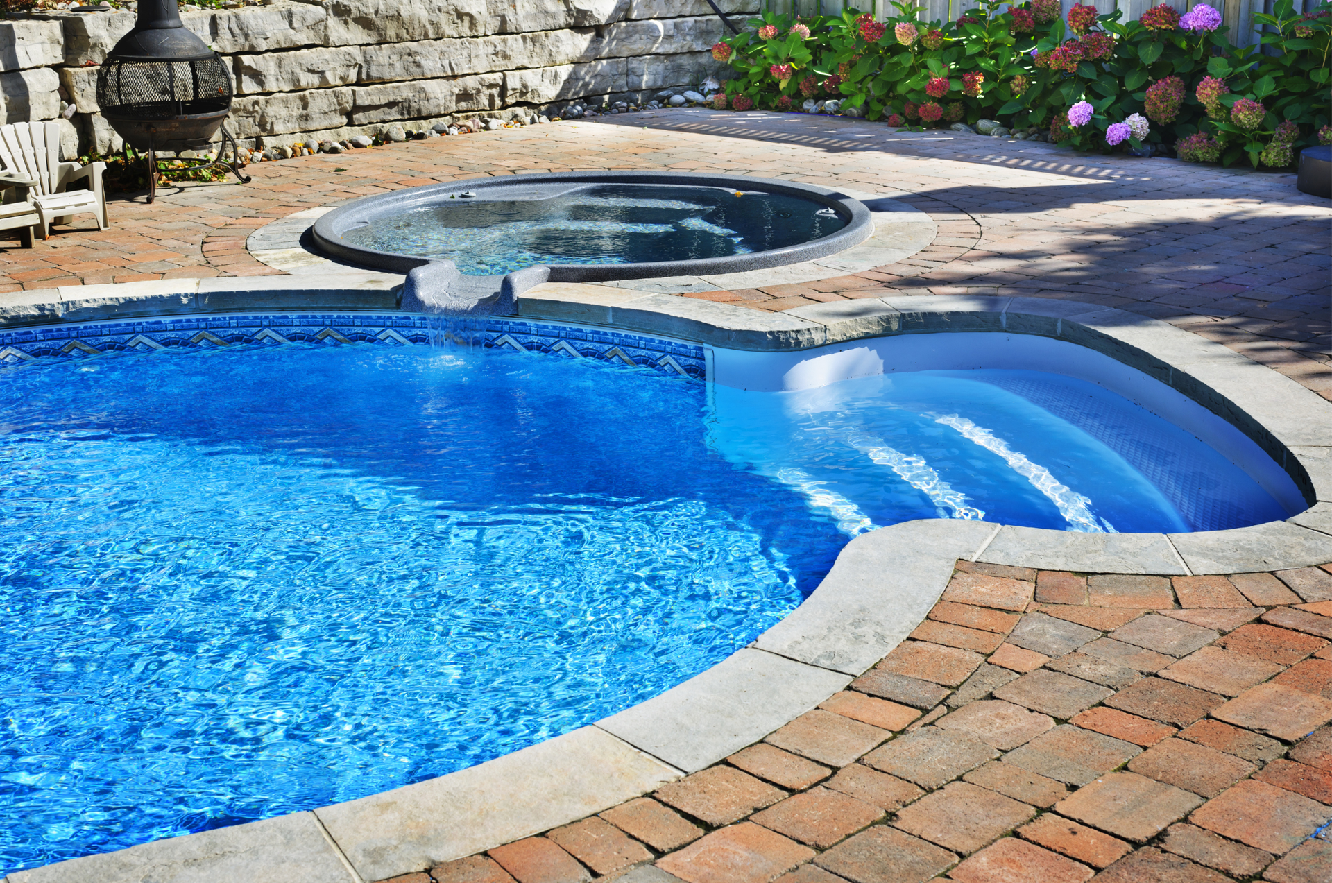A close up of the water in a swimming pool.