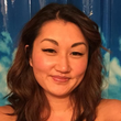 Ashley smiling in her Google review of Executive Beauty Suites