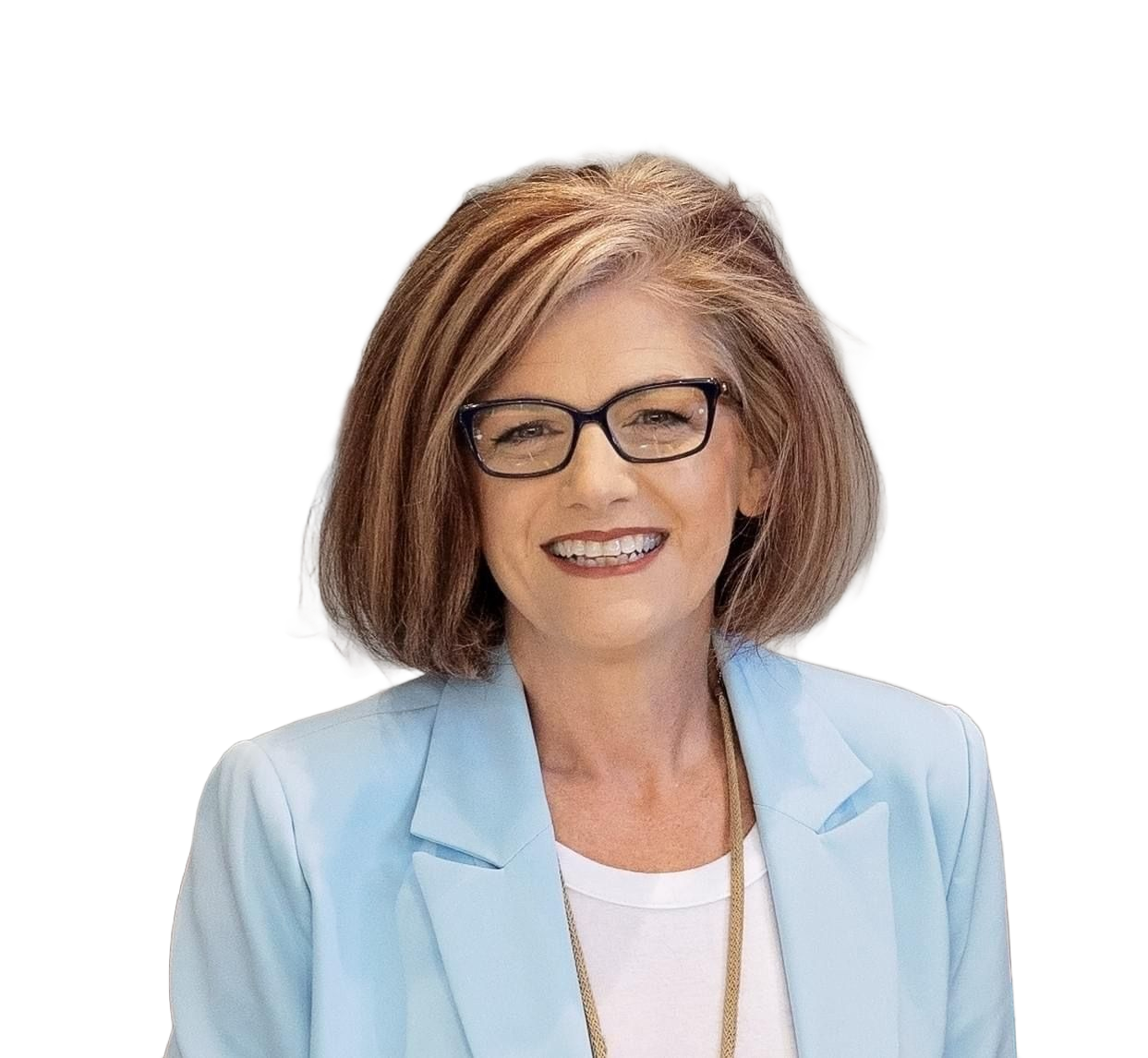 Shelly Frody Owner of Michigan Holland location, smiling for a professional head shot