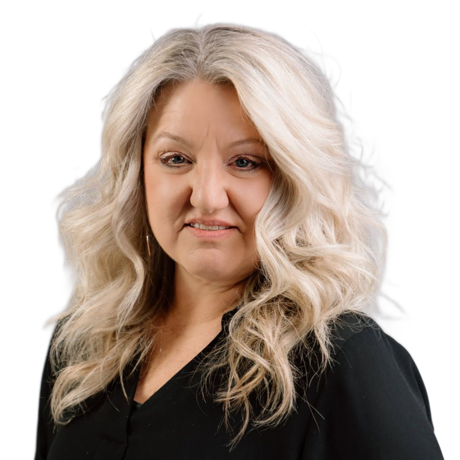 Judy Vanderstelt, Manager and Educator in Michigan Holland location, smiling for a professional head shot.