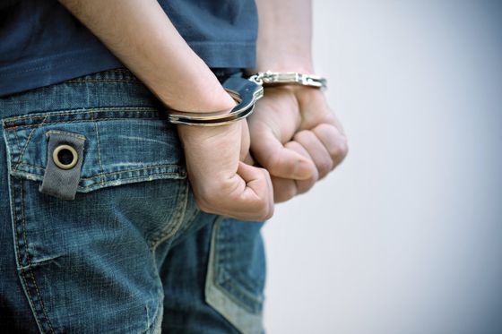 Man in Handcuffs — Linares Law Office — Tooele, Utah Man in Handcuffs — Linares Law Office — Tooele, Utah