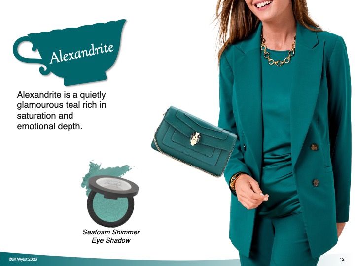 Teal Alexandrite beauty ad with ring and necklace, and model in matching teal suit holding a handbag