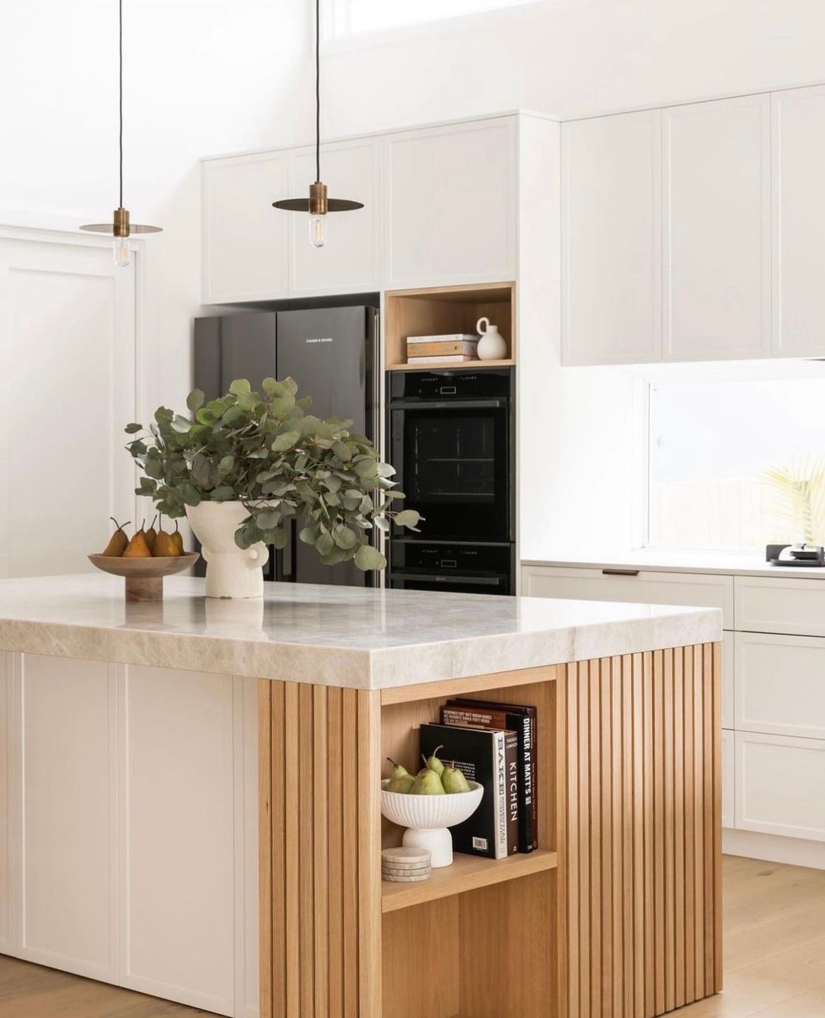 A Kitchen With A Large Island In The Middle Of It — One Lane Financial In Burdell, QLD