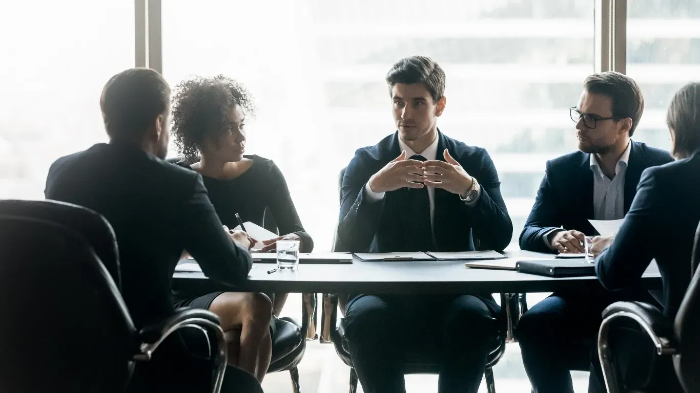 New executive hire collaborating with leadership team after successful executive search placement Chelmsford Massachusetts
