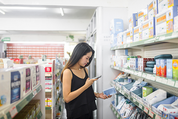 Woman Scans Drugs — Princeton, WV — Hickman’s Pharmacy