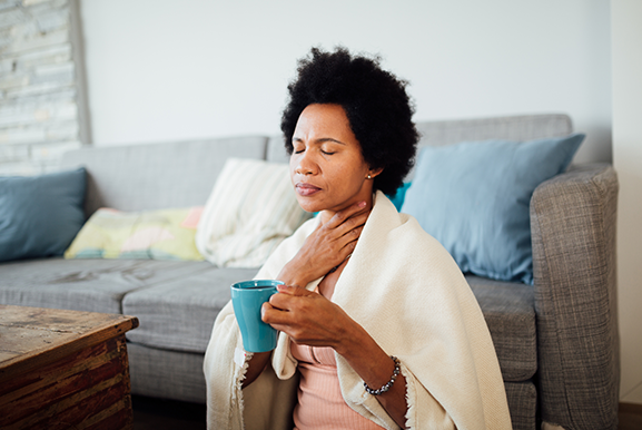 Sick African American Woman Staying at Home — Princeton, WV — Hickman’s Pharmacy