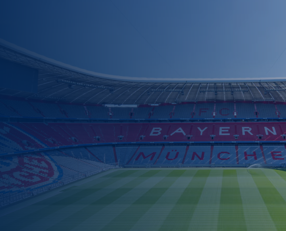 Empty soccer stadium with green field and