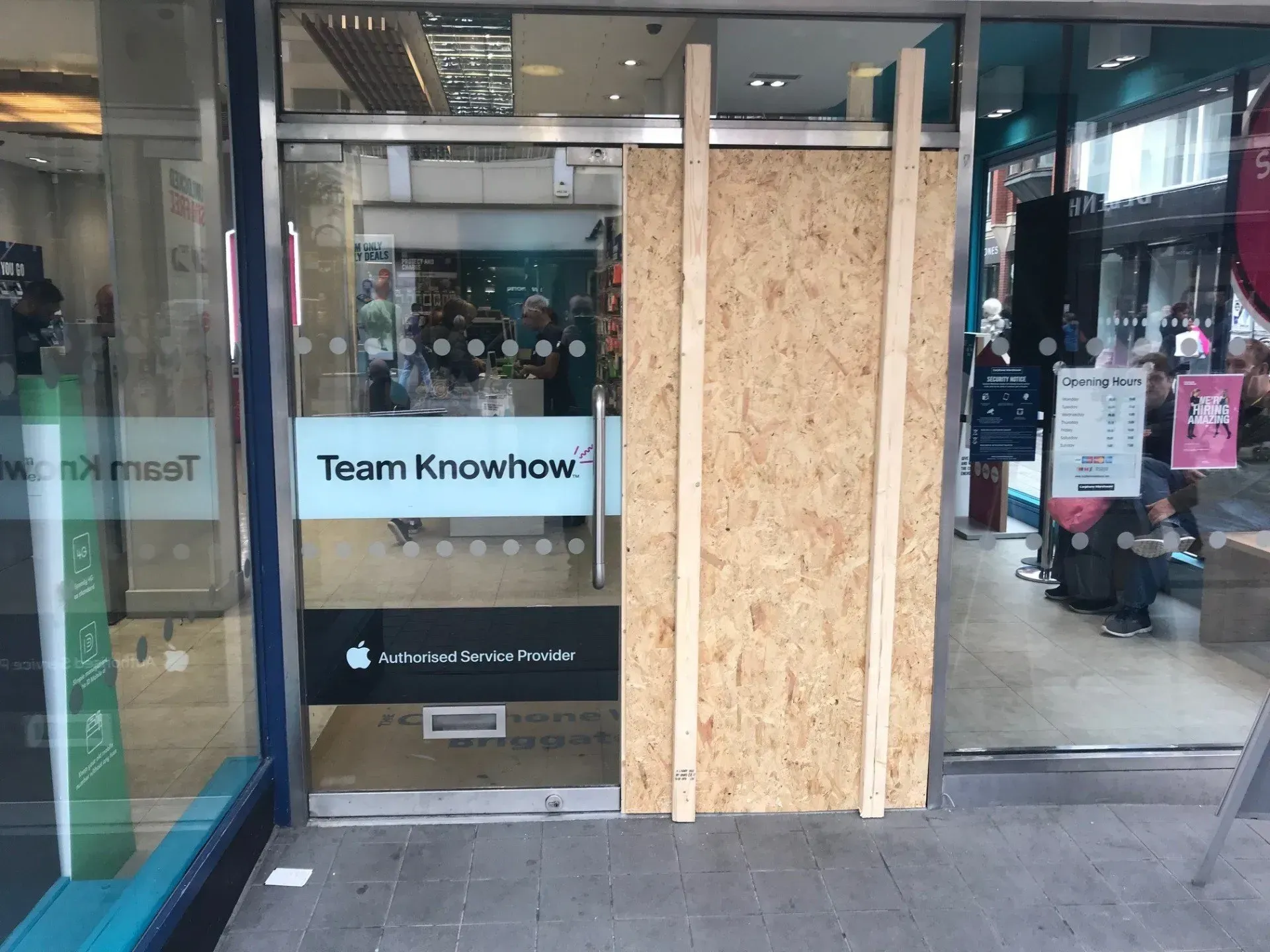Boarded-up storefront of 