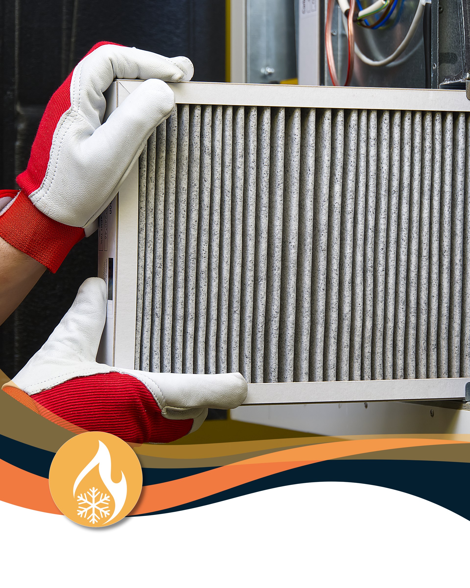 Person wearing gloves removing a dirty air filter from a furnace.