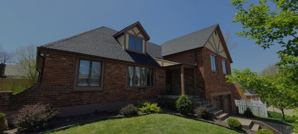 Residential home with a Newly Installed Roof by Lee's Summit Roofing.