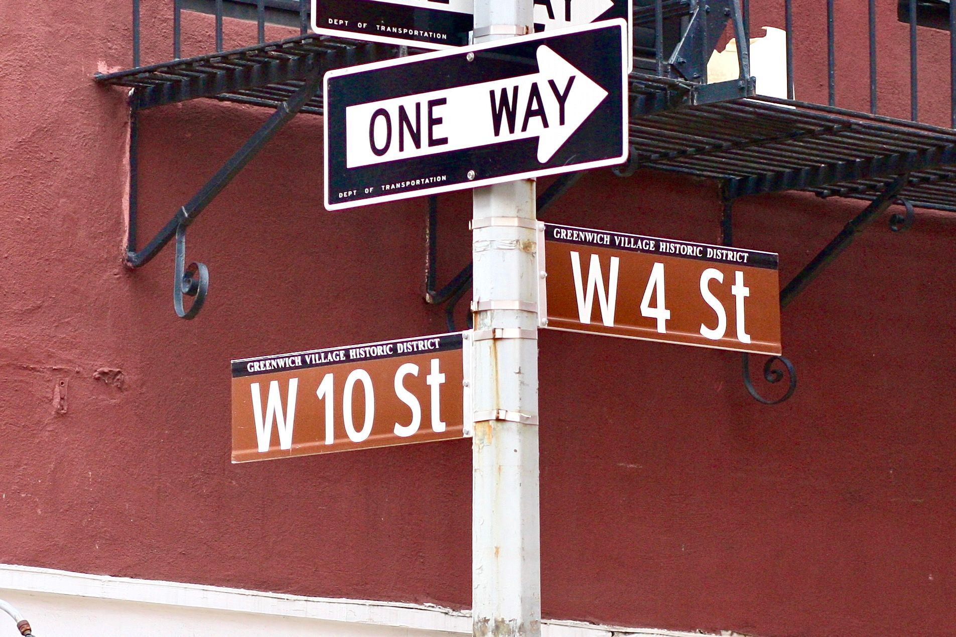 West 4th Street and West 10th Street signs at an unusual intersection in Greenwich Village.