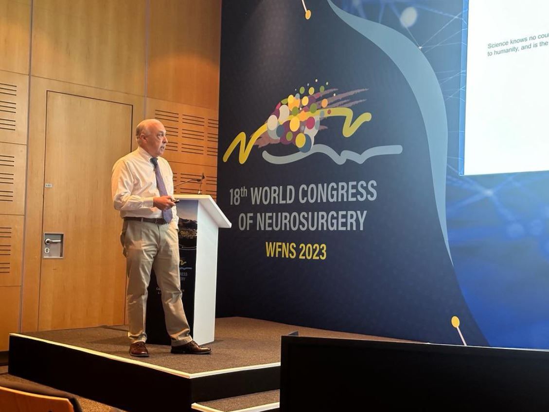Dr. Reisner is giving a presentation at the world congress of neurosurgery Dr. Reisner is giving a presentation at the world congress of neurosurgery
