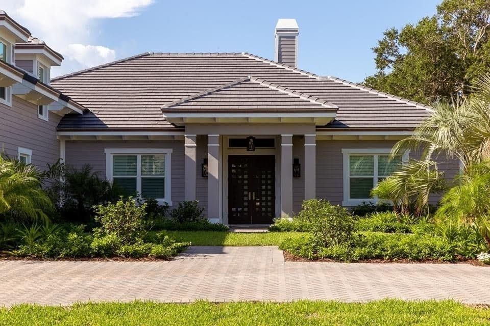 Man Painting Exterior House — Vero Beach, FL — Bucio Painting Inc.