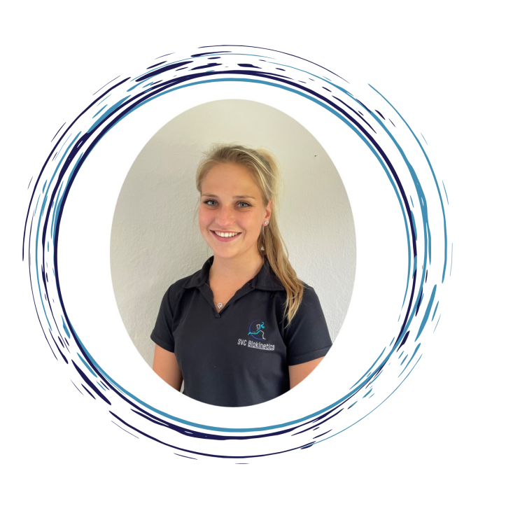 Woman with blonde hair wearing a black polo shirt, smiling, inside a blue circular frame.