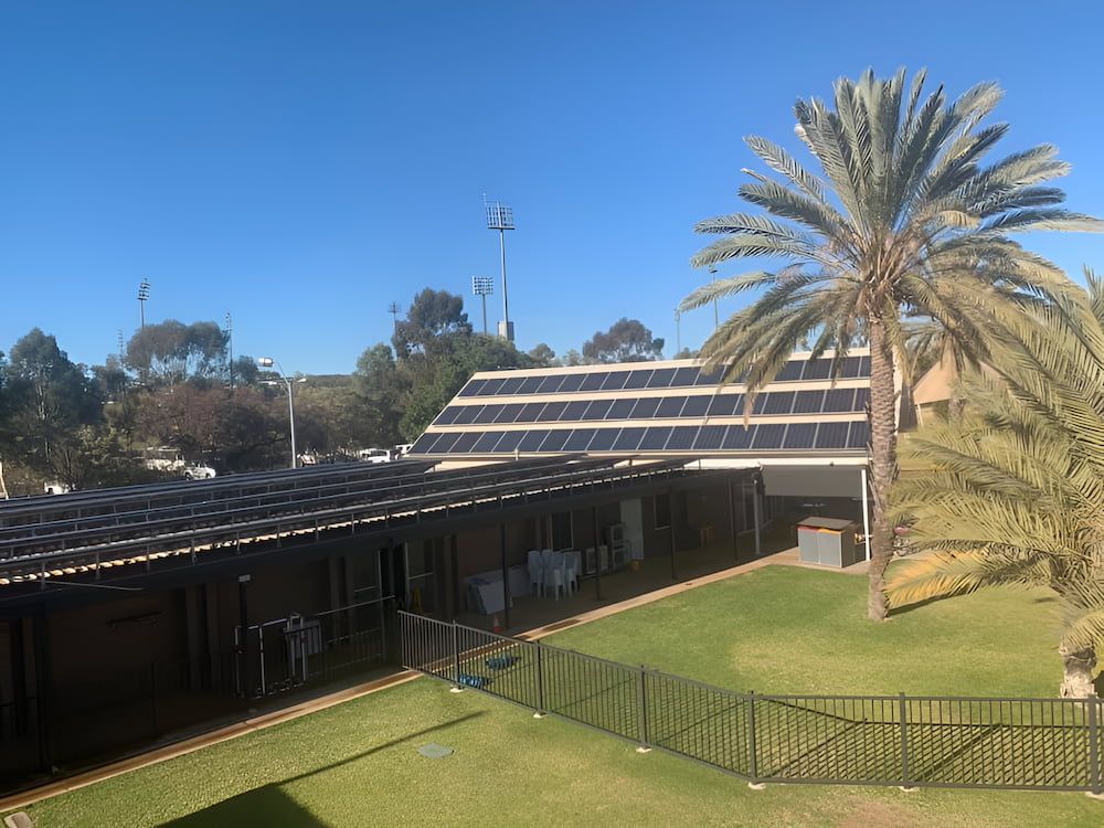 A House With a Lot of Solar Panels on the Roof — Tr!pl3 Fire Electrical & Contracting in Alice Springs, NT