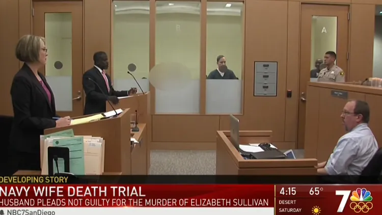Courtroom scene: Husband pleads not guilty in Navy wife's murder trial. Judge, lawyers, defendant present.