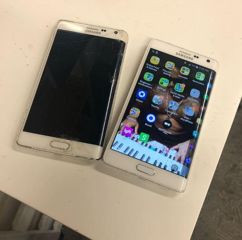 Two white smartphones on a table, one off and one on showing app icons.