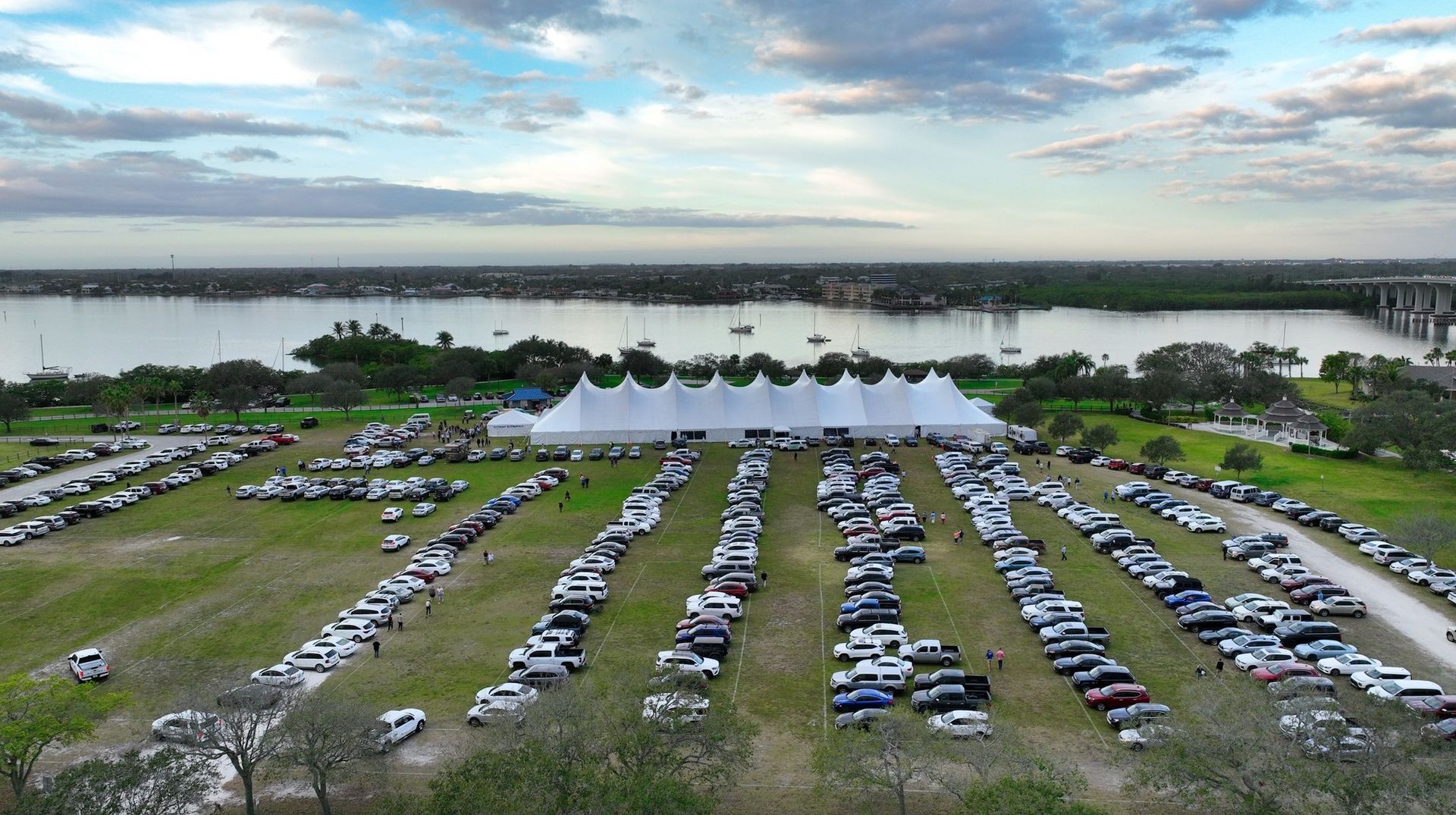 Aerial view of the prayer breakfast tent and arriving guests