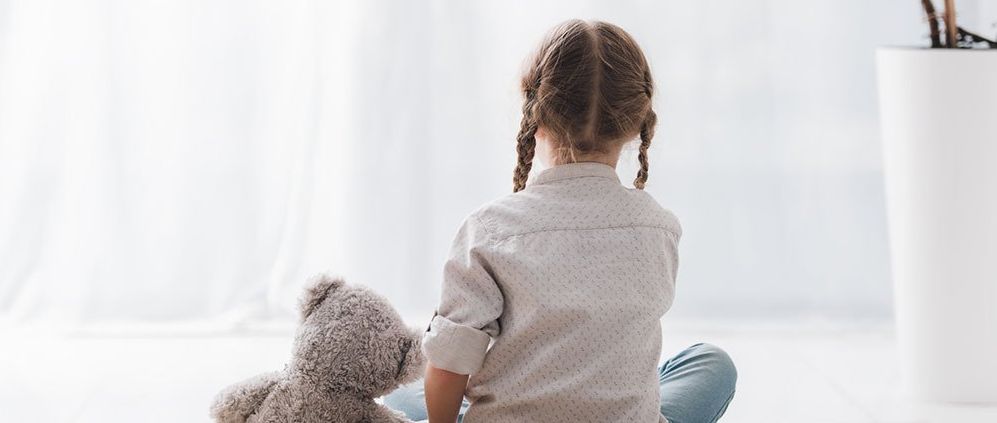 Child with a teddy bear