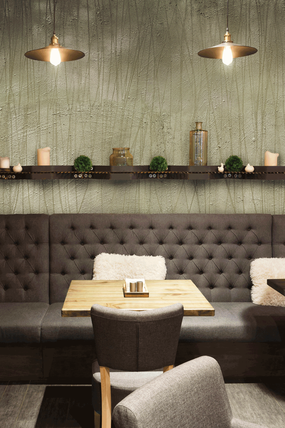 A restaurant with tables and chairs and a couch.