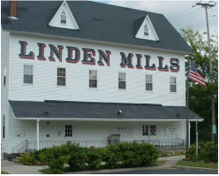A white building with linden mills written on it