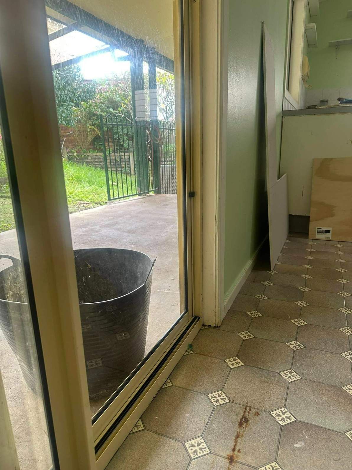 A Room With a Sliding Glass Door Leading to a Patio. — Doobies Cleaning Service in Port Macquarie, NSW