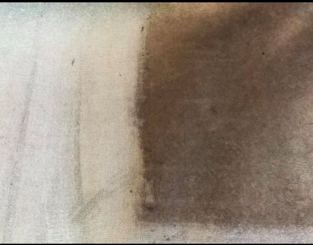 A Close Up of a Piece of Paper With a Brown Stain on It — Doobies Cleaning Service in Port Macquarie, NSW