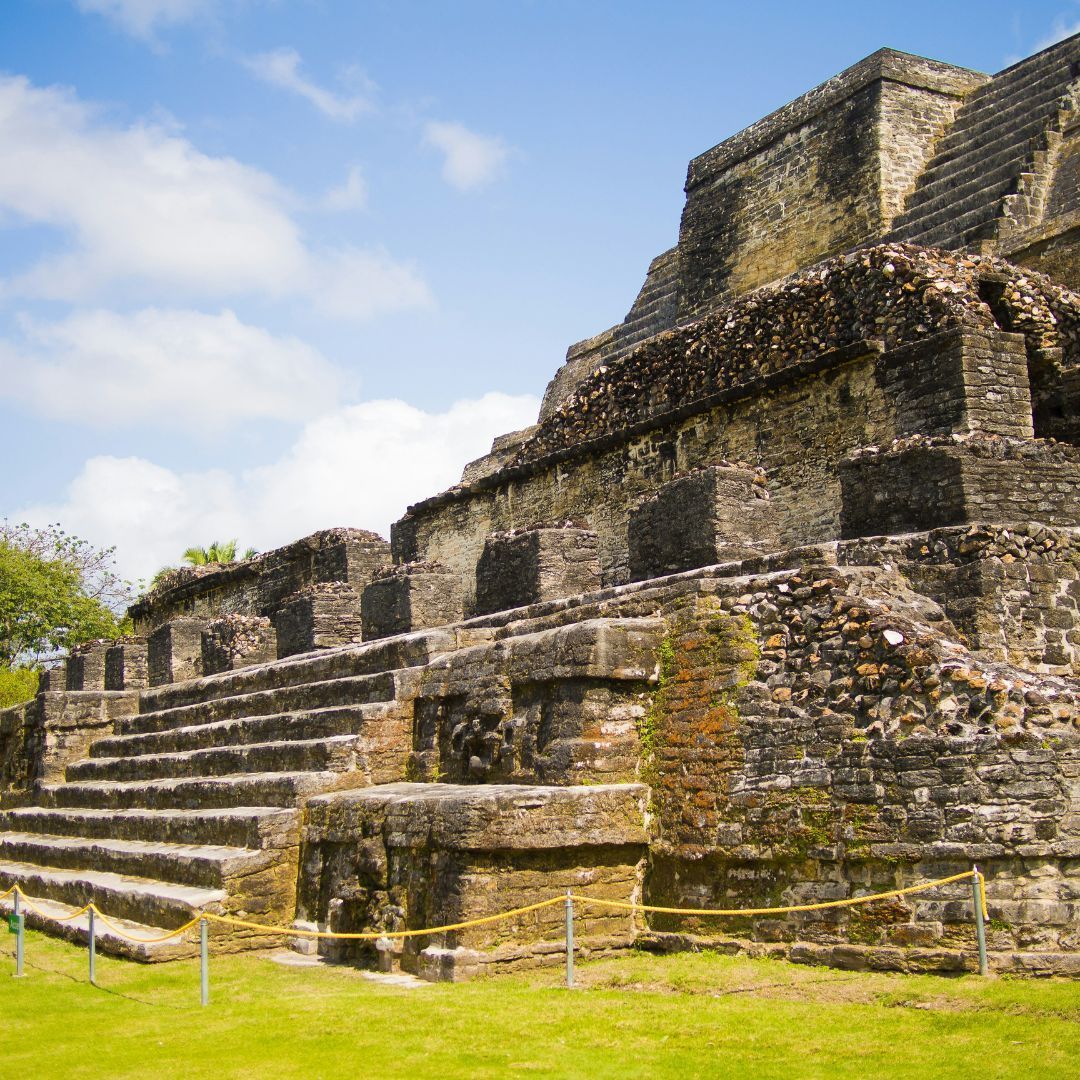 A large stone building with stairs leading up to it