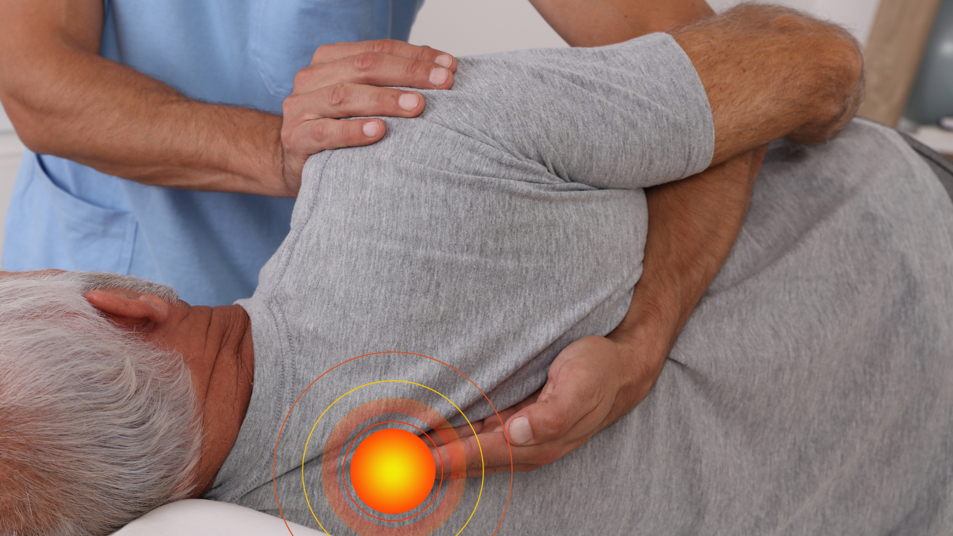 A healthcare professional performs a manual physical therapy adjustment on a patient's upper back, focusing on a sore area.