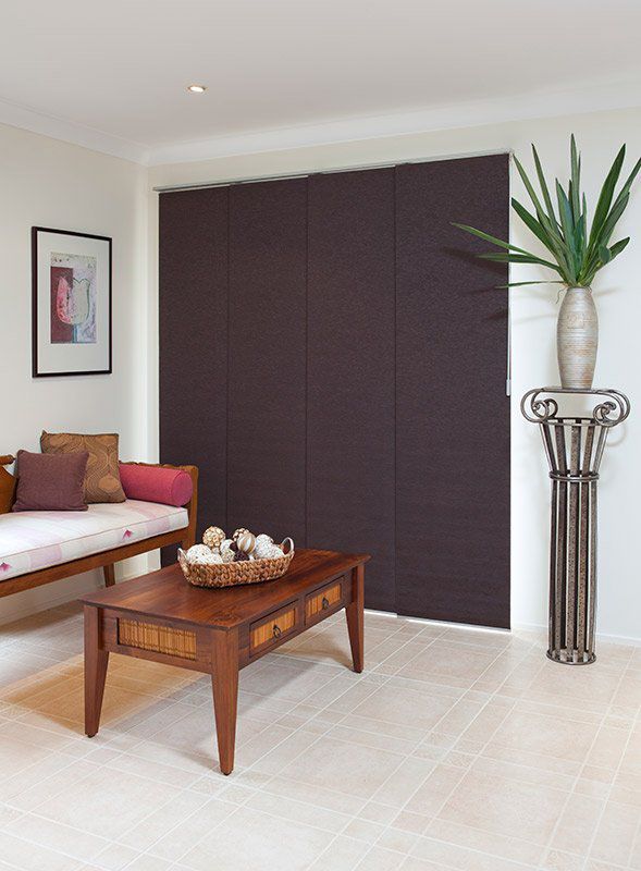 A Living Room with A Couch and A Coffee Table — Creative Curtains & Blinds In Tweed Heads South, NSW
