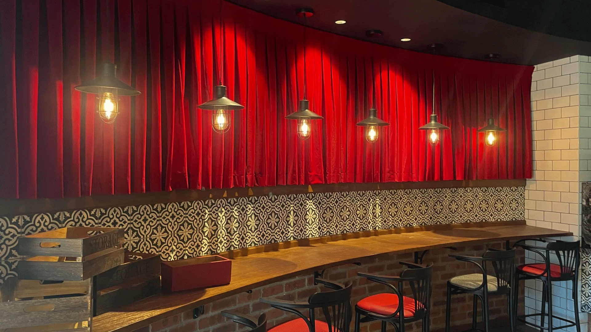 Restaurant With Red Curtains And Tables And Chairs — Creative Curtains & Blinds In Tweed Heads South, NSW