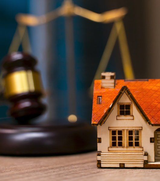 Mini House and Gavel — Greenup, KY — McGinnis Leslie Attorneys At Law Mini House and Gavel — Greenup, KY — McGinnis Leslie Attorneys At Law