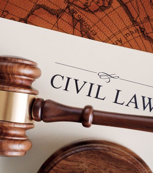 Civil Law Paper and a Gavel — Greenup, KY — McGinnis Leslie Attorneys At Law Civil Law Paper and a Gavel — Greenup, KY — McGinnis Leslie Attorneys At Law