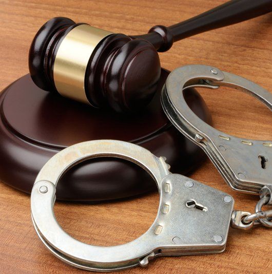 Gavel and Handcuffs — Greenup, KY — McGinnis Leslie Attorneys At Law