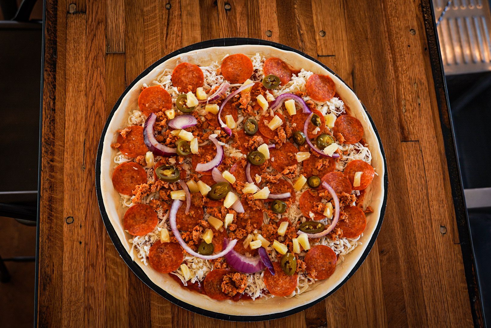 raw pizza prior to baking