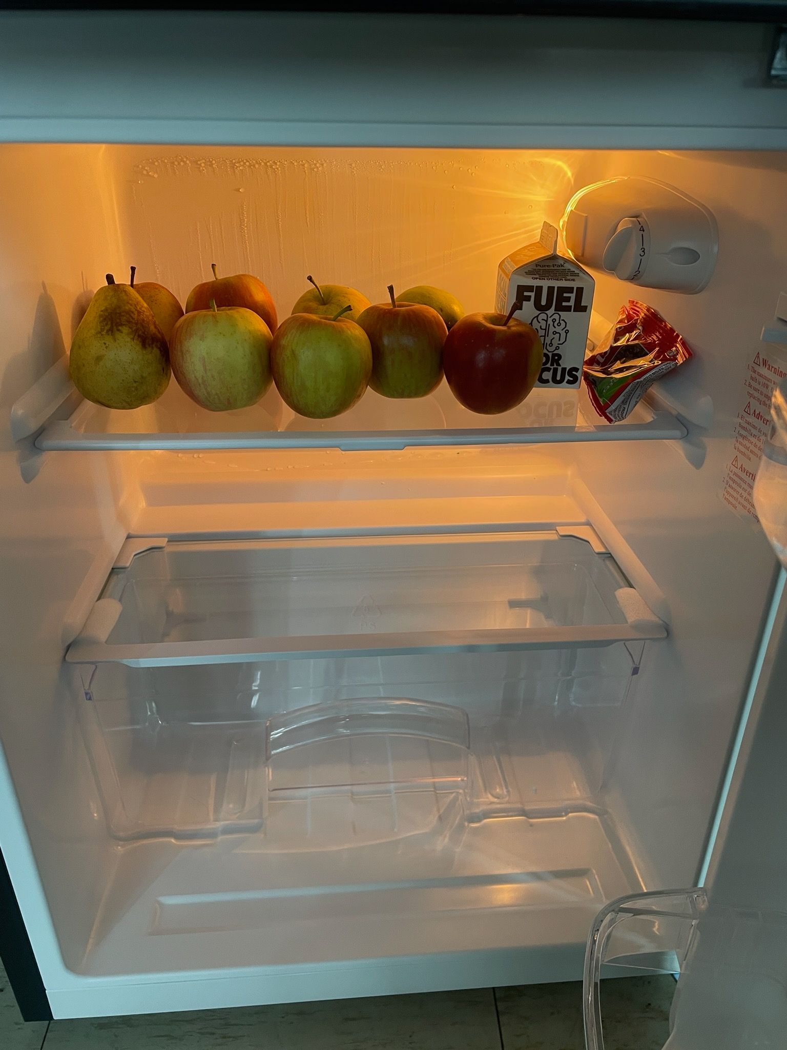 Apples in a fridge