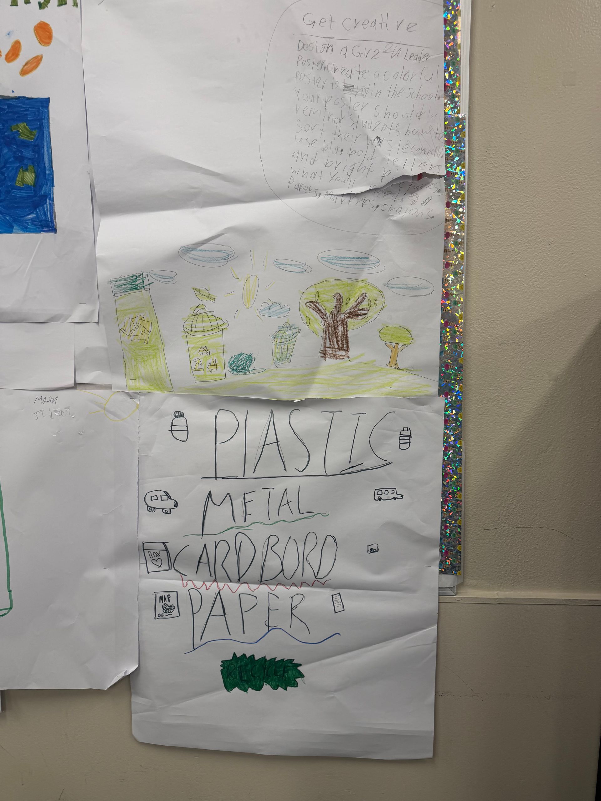 A recycling bin labeled with proper recycling signage.
