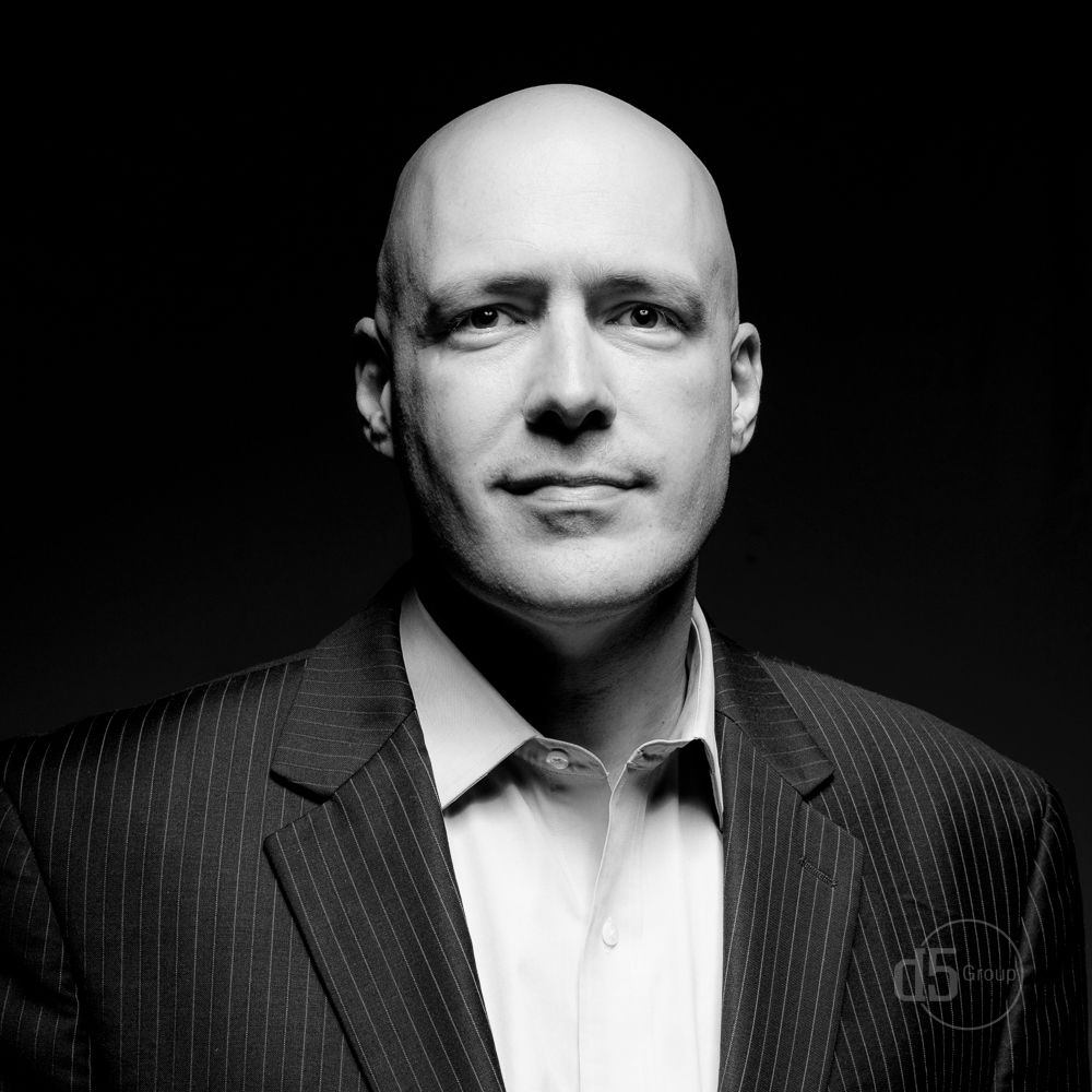 The D5 Group Business Headshot in black and white of a white Male Professional