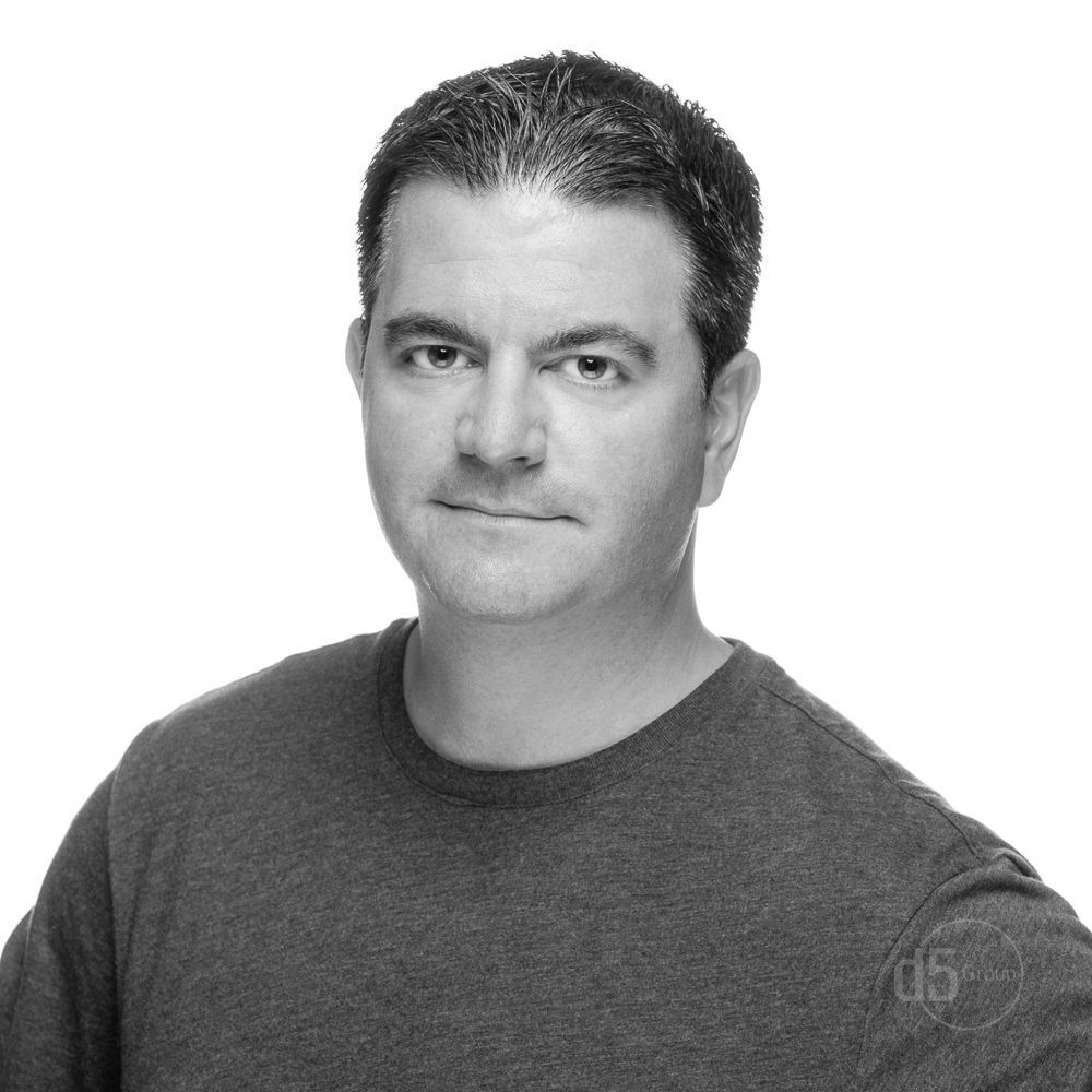 The D5 Group Business Headshot in black and white of a white Male Professional dressed casually