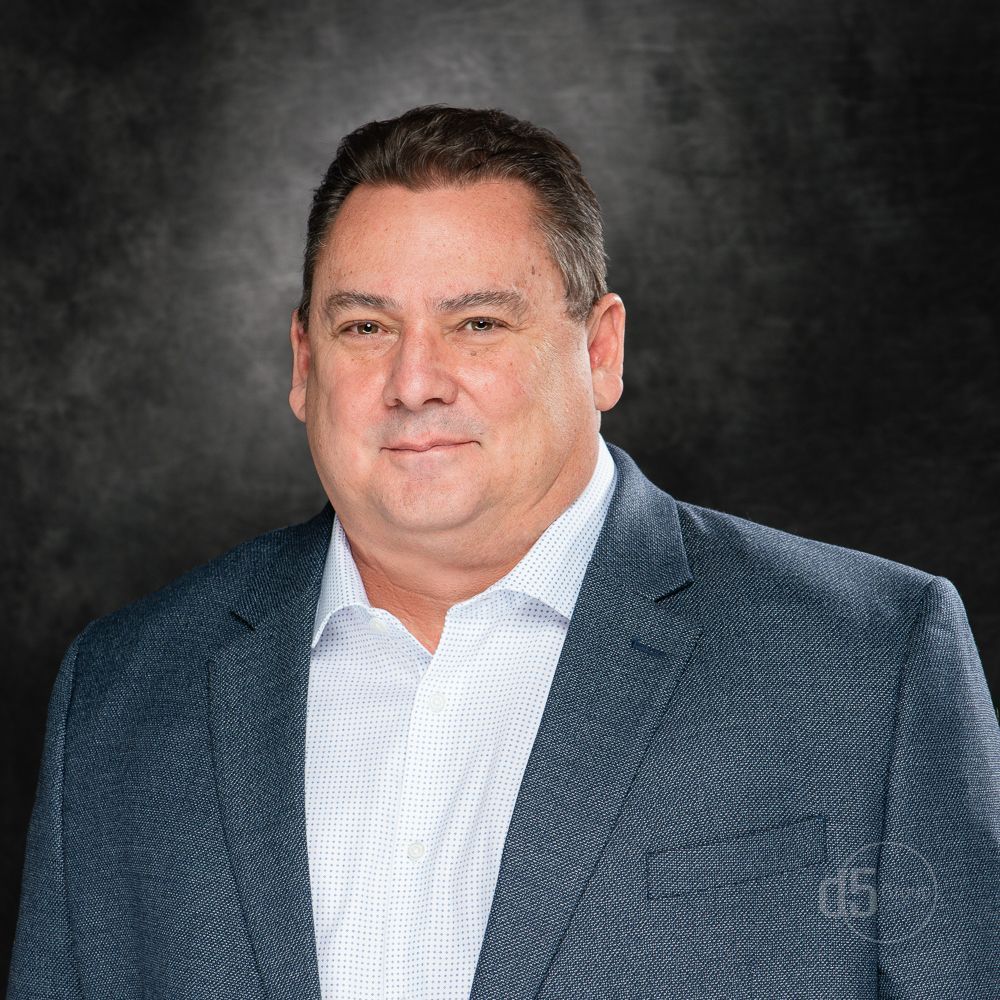 The D5 Group Business Headshot of an older white male Professional