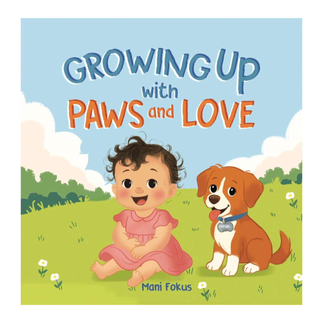 Smiling baby girl and puppy sitting on grass. Text: Growing Up with Paws and Love