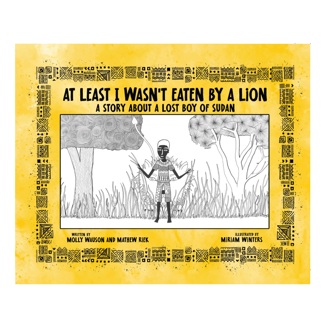 A young boy among grass and trees with a lion behind him. Text: At Least I Wasn
