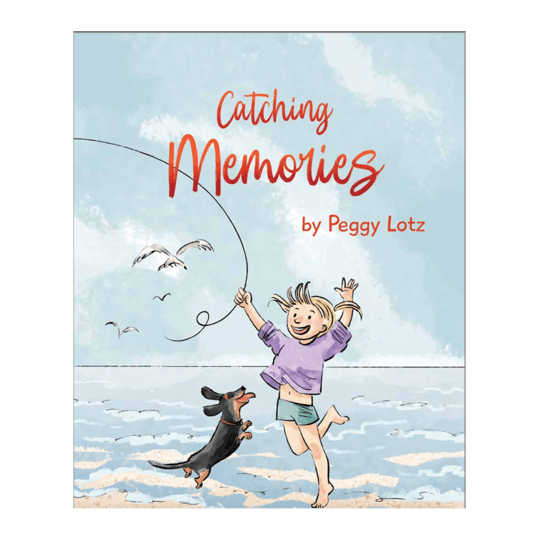 Girl, who is holding a string, and dog are playing on the beach. Text: Catching Memories