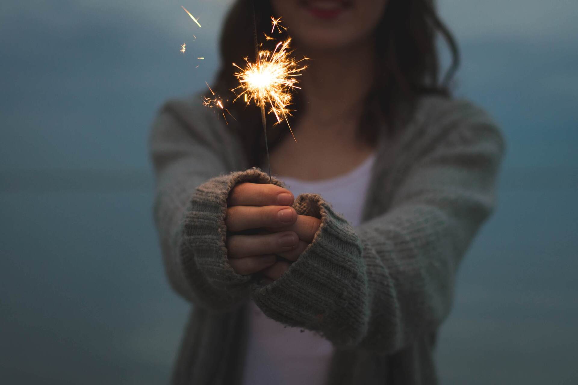 Girl Holding Sparkler at Celebration of Life