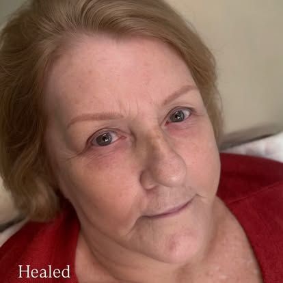 Close-up of a woman in a red top with the word “Healed” in the corner.
